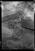 Workers clean up aftermath of railroad accident, Tehachapi, 1937