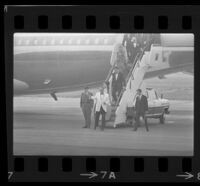 President Johnson, daughter Lynda Bird and Vice President Hubert Humphrey (among others) deboard Air Force One, 1967