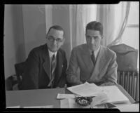 Donald Renshaw and James Pinkney of the National Recovery Adm., in the N.R.A. office at the Chamber of Commerce Building, Los Angeles, 1934