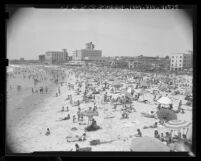 Shoreline crowed with beach goers in Santa Monica, Calif., 1947