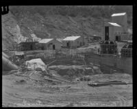 View of penstocks and generators on original bases during the reconstruction of the Bureau of Power and Light's Power House #2, San Francisquito Canyon, 1928