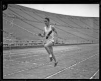 High school track athlete Vic Klein running at the Memorial Coliseum, Los Angeles, 1924-1926