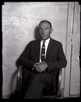 Harry Alpine seated after being charged in a shooting, Los Angeles, 1925