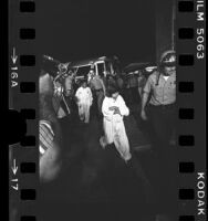 Sheriffs escorting rescued children of Chowchilla bus kidnapping, Calif., 1976