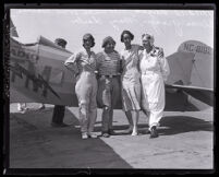 Pilots Mildred Morgan, "Pancho" (Florence) Barnes, Clema Grange and Mary Charles in front of Morgan's plane, Santa Monica, 1931