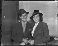 Theatrical agent, Walter Kane and actress, Lynn Bari who were filing for a marriage license, Los Angeles, 1938