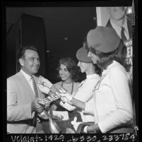 Three Reagan Girls handing out Ronald Reagan campaign stickers and buttons, Calif., 1966