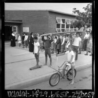 Students filing into the American Martyrs School on first day of classes as public school students play in Manhattan Beach, Calif., 1965