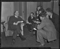 Henry L. Roosevelt, Assistant Secretary of the Navy, with reporters, Los Angeles, 1933