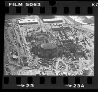 Aerial view of construction of San Onofre Nuclear Power Plant, Calif., 1976