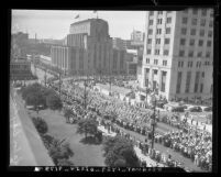 Labor Day parade as it passes by City Hall, with the State Building and The Times Building in Los Angeles, Calif., 1937