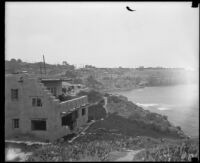 Pueblo-revival style house on shoreline cliff, San Diego vicinity, 1920-1939