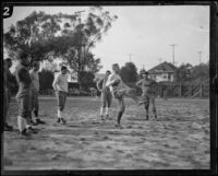 USC head football coach Howard Jones demonstrating at a practice, Los Angeles, 1925-1939