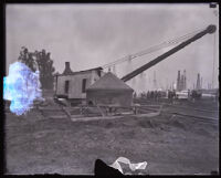 Steel cap used to cap burning oil well, Santa Fe Springs, 1928