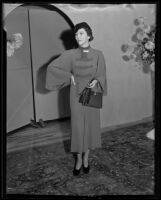 Woman models dress with dolman sleeves at the Times' fashion show, Los Angeles, 1935