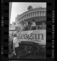 California Governor George Deukmejian talking to reporters from train in Los Angeles, Calif., 1984