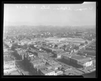 Cityscape of Union Station site grading work and surrounding buildings in Los Angeles, Calif., 1935