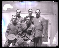 Group portrait of five police officers, four of whom captured bank robbers, Los Angeles, 1925