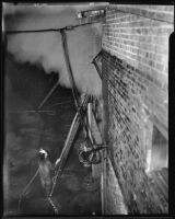 Firefighters battle flames at W. E. Bockmon Pottery and Tile Company, Los Angeles, 1935