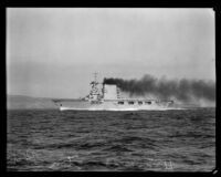 USS Lexington, one of the Navy's earliest aircraft carriers, cruises in coastal waters, California