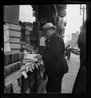 Book stall, probably in the vicinity of the old Los Angeles Times Building, Los Angeles, 1938