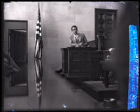 Perry Askam on the witness stand during actor Paul Kelly's murder trial, Los Angeles, 1927