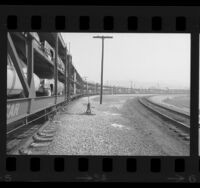 Freight train loaded with General Motor cars in the City of Industry, 1970