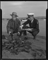 Captain Edward Hyde and Ray Ellis help stop poachers, Newport Beach, 1935