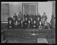 Newly chosen 1936 Grand Jury Mmes. Florence Campbell, Dorothy Hitchcock, Anna May Dunlap, Katherine Mounsey, Pearl Marsh, Catherine E. Breslin, Margaret Kaeding, Superior Judge Thomas L. Ambrose, R. H. Tuttle, Emmett R. Aiken, George B. Warren, C. V. Lane, Dr. Anders Peterson, Harry Beaman, C. E. Fisher, Roy R. Hall, Robert S. Redinton, C. R. Burrows, Frank Holman, James B. Agnew, and Dep. Dist.-Atty. Bialock, Los Angeles, 1936