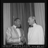 Carl T. Rowan and Dr. Lewis Webster Jones at the National Conference of Christians and Jews, 1964