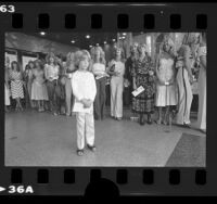 Eight-year-old Shannon Derrick with older contestants in Farrah Fawcett look-alike contest, Los Angeles, Calif., 1978