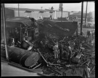 Burned buildings and truck, Los Angeles, 1938