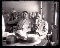 Frank Keaton seated next to Detective lieutenant Romero at his murder trial, Los Angeles, 1930