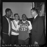 Los Angeles Lakers coach Fred Schaus with rookie Walt Hazzard, Elgin Baylor and Jerry West, 1964