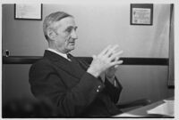 W. G. McAdoo seated at his desk, circa 1933-1938