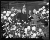 Judge Newcomb Condee takes an oath in a courtroom, Los Angeles, 1930s