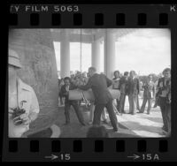 John S. Gibson Jr. and J. Kim ringing the Korean Bell of Friendship in San Pedro, Calif., 1976