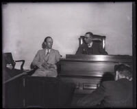 James Reid on the witness stand during the coroner's inquest of the murder of Anne Nerrell, Los Angeles, 1932