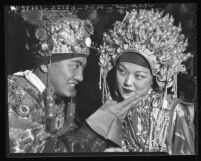 Roland Gott and Kwai On, actors in a theater company based in Los Angeles' Chinatown, 1939