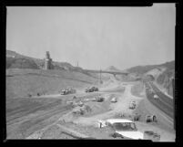 Grading work on section of San Diego Freeway running across Santa Monica Mountains, Calif., 1961