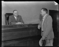 Fred Wiegland approaches Judge William R. McKay's bench, Los Angeles vicinity, circa 1932-1939