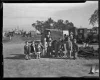 Woman and children standing at unemployment settlement, Los Angeles, 1929-1939