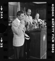 Mayor Tom Bradley, Police Chief Darryl Gates, and Police Commmision President Stephen Reinhardt