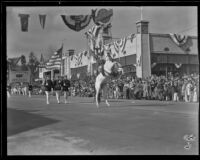 Officer on a rearing white horse in the Tournament of Roses Parade, Pasadena, 1932