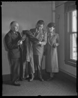 Louis Rifkin, Judge Joseph Marchetti and Rafaela Ottiano inspect a fur ...