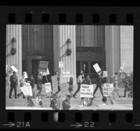 Pickets with signs reading "We Back Reagan" and "Support the Governor" on steps of Old State Building in Los Angeles, Calif., 1967