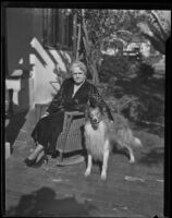 Mrs. Will Lee Austin sits on her patio with her dog, Los Angeles, 1935