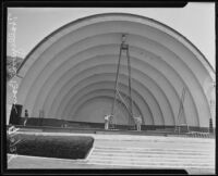 Martin Sipma painting the shell of the Hollywood Bowl, Los Angeles, 1935