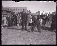 J. S. Severance with a full shovel during the First Unitarian Church groundbreaking, Los Angeles, 1926