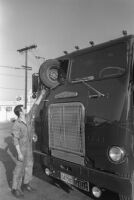 Wheel lodged into gasoline truck's windshield, California, 1969